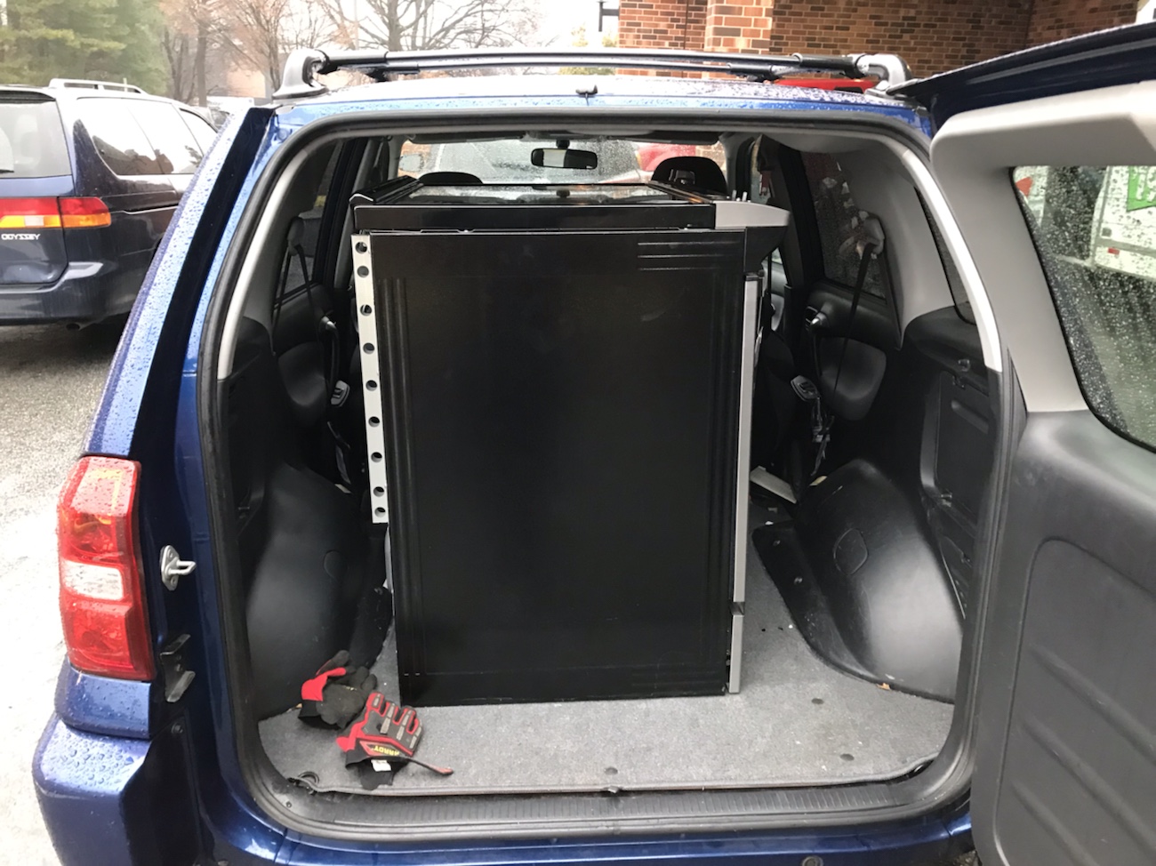 Toyota RAV4 with kitchen stove in back