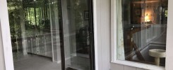Old 1980s sliding door and new MCM vinyl high efficiency window